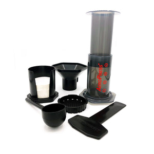 aeropress coffee maker kit with scoop, funnel, paper filters with holder, and stirrer at lambertville trading company